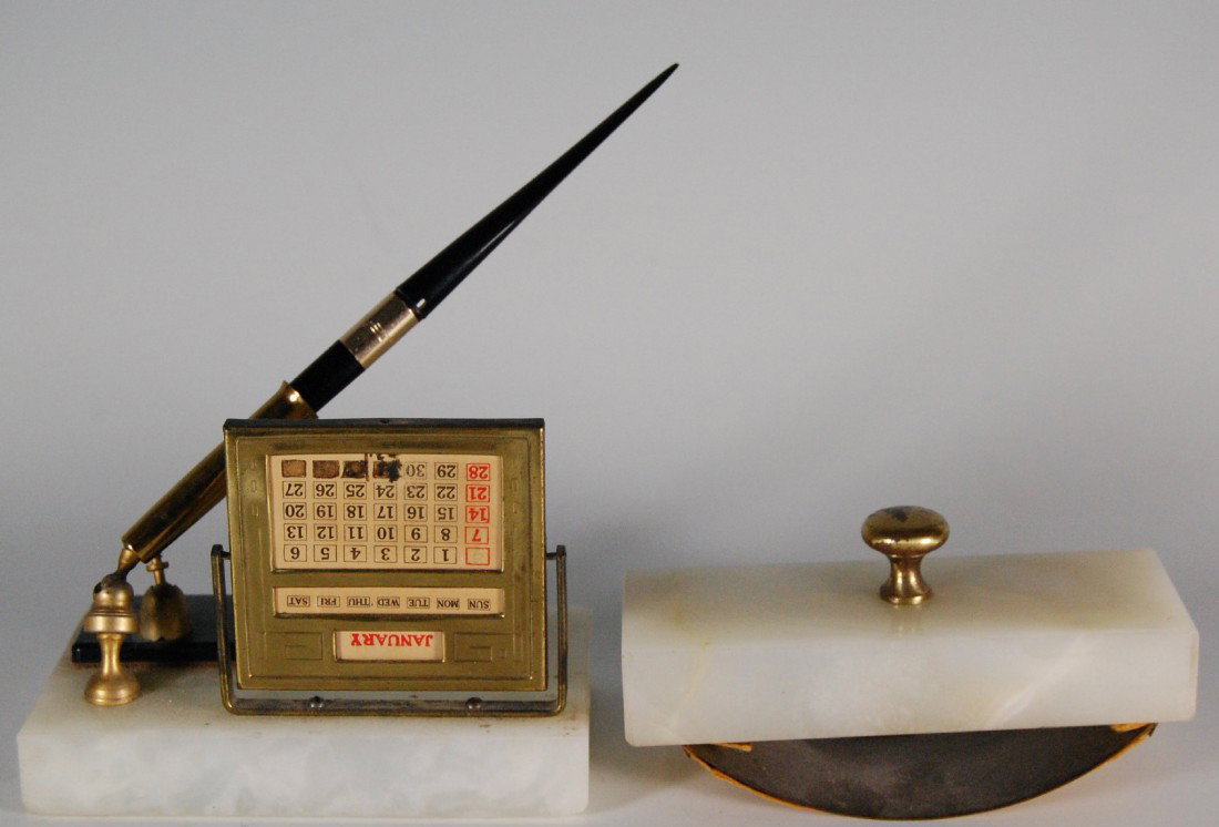 Desk Set, brass & onyx Desk set constructed of bra: Desk set constructed of brass, plastic and onyx. The top of the calendar holder marked "Diamond Pointer" . The blotter made of onyx and brass handled. A replaced pen marked 'Forever". Mid 20th century