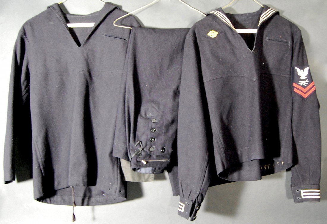 Navy Uniforms, 3pcs, WWII: Navy Uniforms, Three pieces of men's uniform, WWII. Manufactured by The Naval Clothing Factory. Navy blue wool. Two tunic, pull-over shirts and one pair of pants. Size Folded Altogether: 8" H X 15" W 