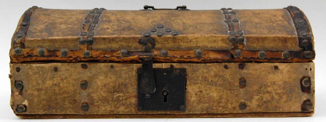 Dome top box, hide covered, H.B. Mounee, c. 1800: Dome top pine box hide covered with brass bale, inscribed by the owner twice on the lid H. B. Mounee?. Brass tacks for fastening and decoration, iron lock with hasp, no key. Interior is covered in blu