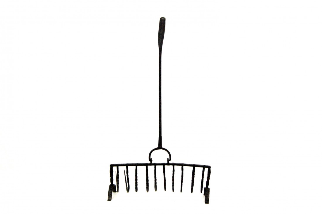 Toaster, Wrought Iron, c. 1800: Hand wrought iron toaster with ten twist tines in a U-shape, each end peened over a rail supported by upright columns of shaped design and resting on arched and turned up feet. A hole in the handle ti