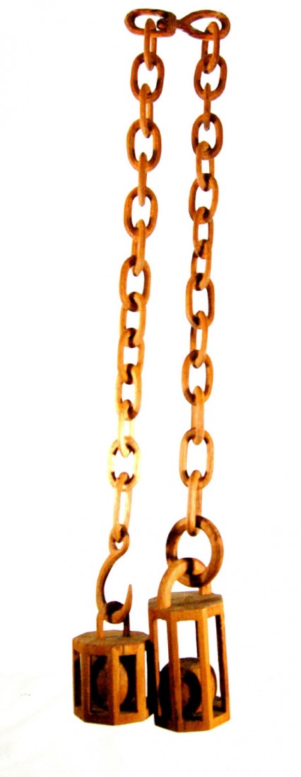 Wood Whimsy chain, 19th C.: Wood Whimsy Chain, 19th century Carved from a single piece of pine with an added ball in cage. Unusual in that one piece has a pivoting link. These were generally made by sailors. 19th century. Size: 