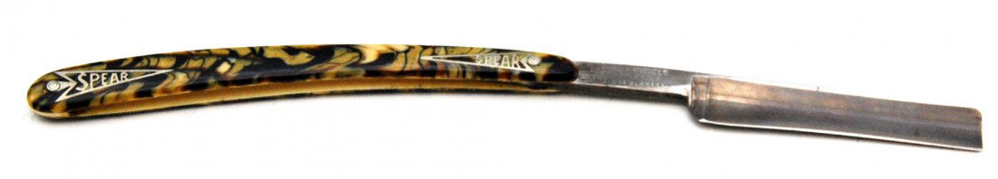 Straight Razor marked Spear, Straight razor marked: Straight razor marked Peter J. Michels, Brooklyn, N.Y. (the retailer) and Made in Germany. 5/5" square point with hollow ground blade and celluloid handle marked "Spear" in silver inlays in four place