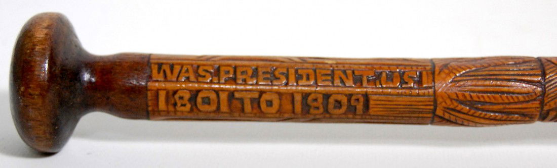 Cane, Thomas Jefferson tribute by Craddock Cane, L: Cane, Likely carved from wood taken near the tomb of Jefferson as was the custom of Thomas Jefferson Craddock. In relief around the cane is "Thos. Jefferson of VA, Born Apr. 13, 1743, Was President U.