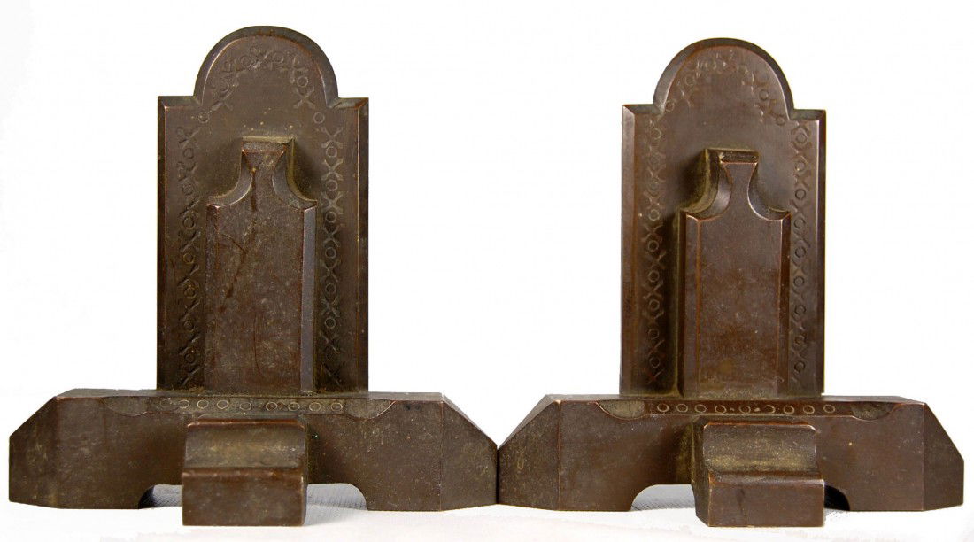 Pair Bookends in bronze, art deco: Pair Bookends in bronze, art deco Pair of bookends cast in bronze of a stylized skyscraper with tombstone back panel. In the art deco taste, circa 1930. Three part construction held by extremely well
