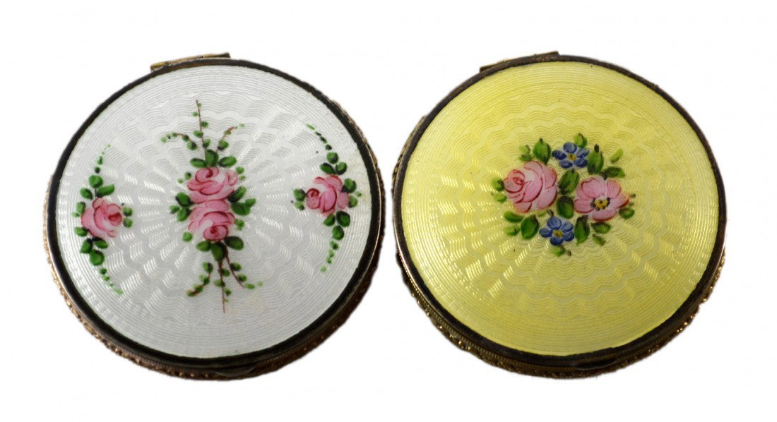 Compacts, (2), Enamel Tops, c. 1930: Two Compacts having enamel tops, hand decorated with floral motifs, c. 1930. Marked B B Co. and each has the original puff. Size: D. 2.25" Weight: Total 4.7oz Condition: One unused and one very good
