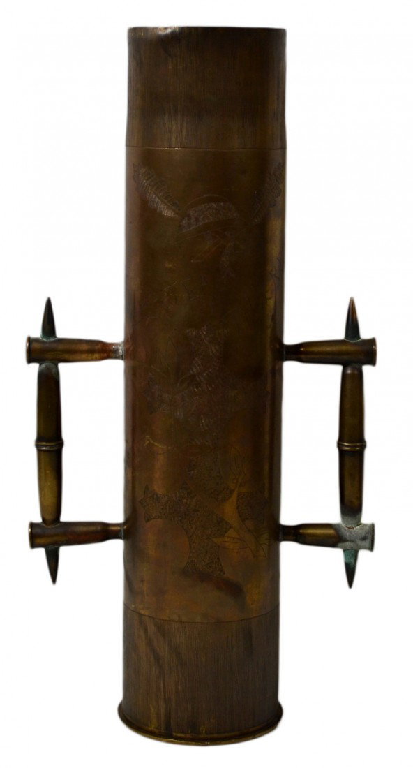Trench Art-Shell w/Bullet Handles, WWI: Trench Art-Shell w/Bullet Handles, WWI - a large 75mm shell that has been hand engraved with flowers, oak leaves, and a cross. Eight center fire rifle cartridges have been combined together to form th