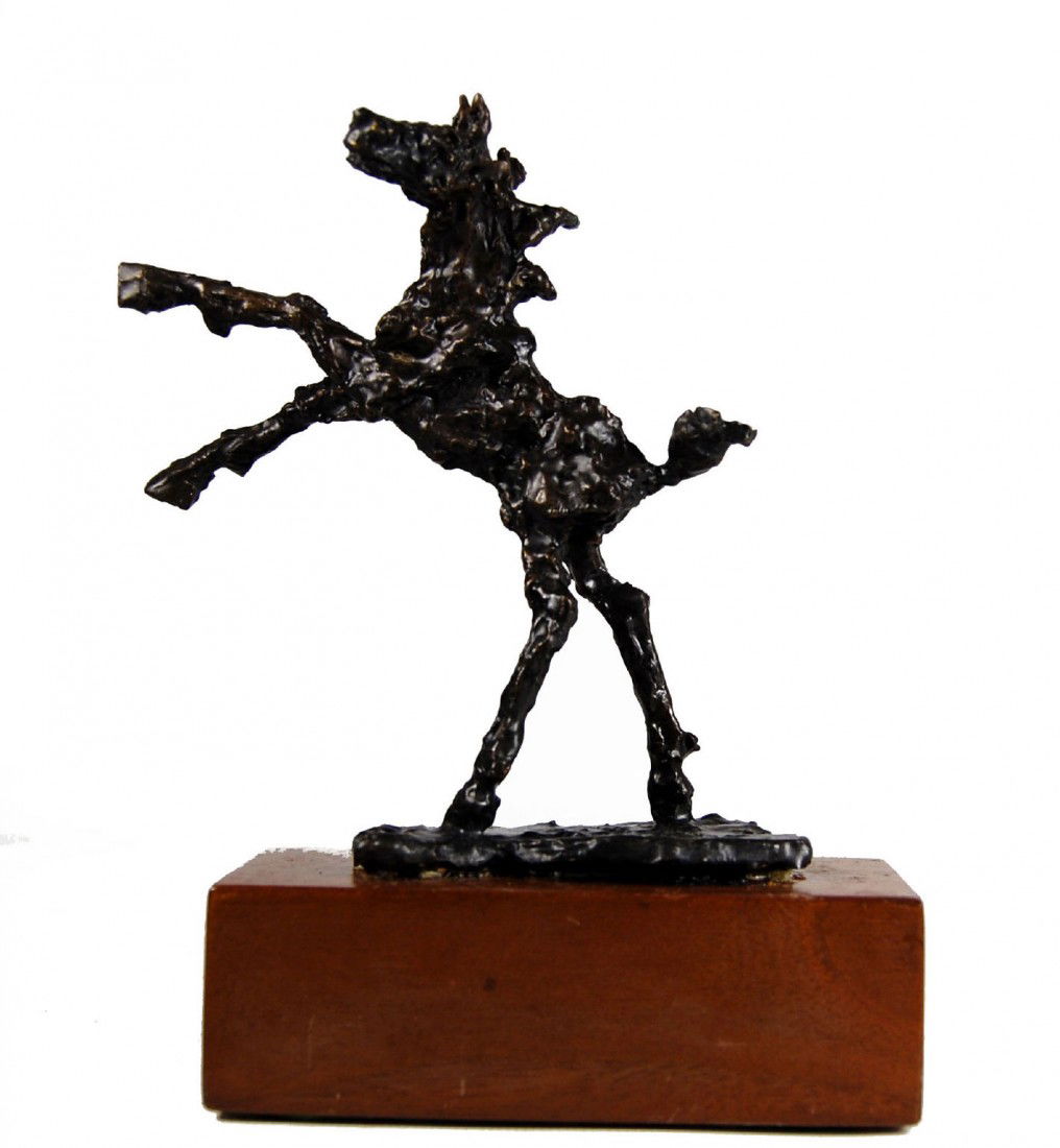Bronze "Horse Puppy" by Cotsy Engel: Sculpture titled "Horse Puppy" cast in bronze and signed C. E. also marked 5/95. Mounted on a wood base with the original brass title plaque. Cotsy Engel female sculptor and artist died in 2009 at the