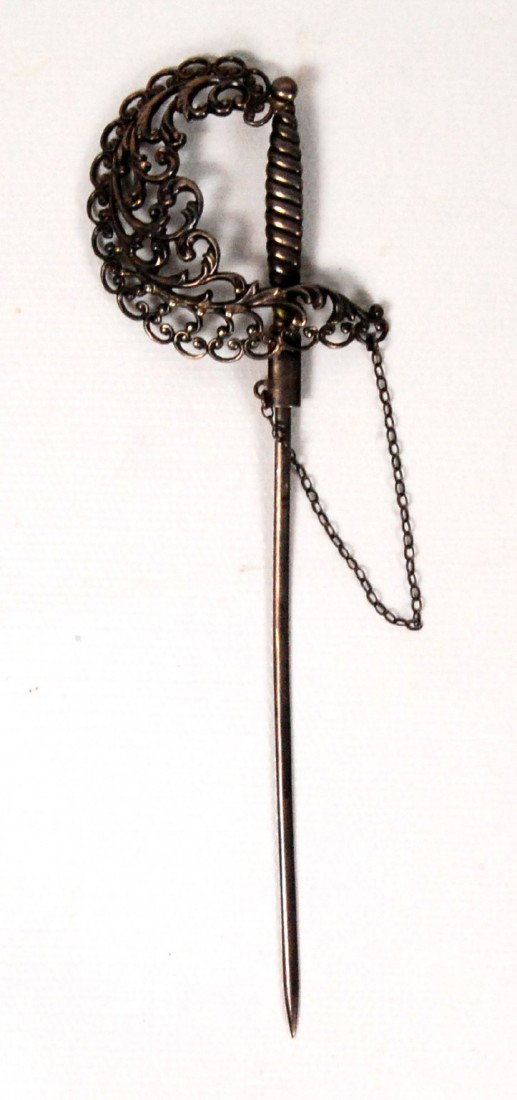 Hat Pin Sword, Sterling Silver wire wrapped: Sterling silver hat pin marked. Well formed with simulated wire wrapped grip and fancy 'hilt'. Size: 6" x 1.5" Weight: 5 grams Condition: very good