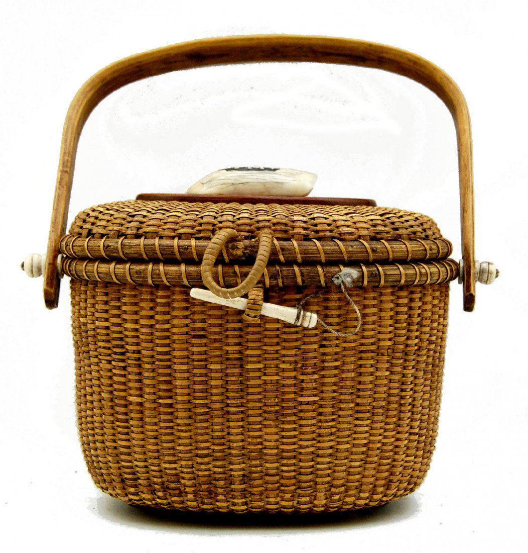 Nantucket Basket woven by Paul Whitten, c. 1975: Nantucket Basket, woven by Paul F. Whitten, circa 1975. Scrimshaw whale tooth top. Tooth scrimshaw done & signed C.W. Vandehoop of the native American Wampanog tribe of Mashpee. The weaver, Paul Whitt