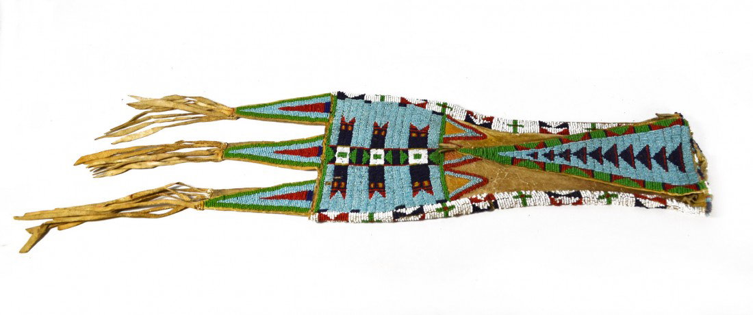 Arapaho Tobacco Tab Bag, sinew sewn: Native American Indian Tobacco tab bag, Arapaho, large beaded & fringe model. Sinew sewn bag is made of soft hide leather, likely from buffalo or deer. Very elaborate and colorful beadwork, and quite