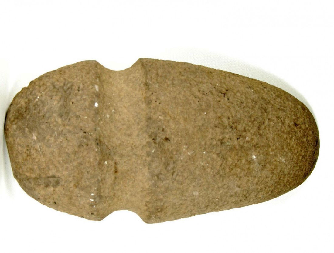 Native American Stone Axe, Massive: Very large stone axe, native American, full round grooved made of hard granite with desirable brown patina. Eastern Woodlands Size: L. 11" x W. 5.5" x T. 2.25" Weight: 7.70 pounds Condition: very good