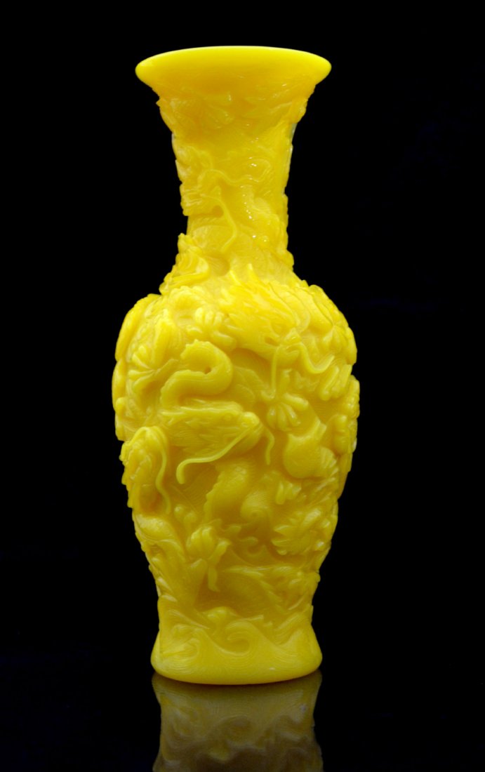 Peking glass 7" vase, Imperial yellow, 18th C: Peking glass 7" vase, Imperial yellow, deeply carved dragon vase. Mark on bottom indicates which hall it came from within the Forbidden City. 18th C From the Ina & Sandford Gadient Collection. Size: 7