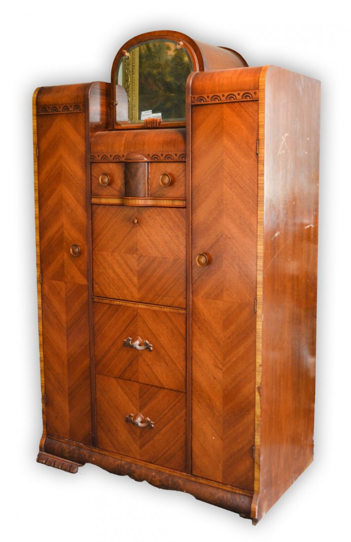 Compact Dresser/Desk-Art Deco Guests: Compact Guest's Dresser/Desk- Period Art Deco Piece constructed of solids and veneers. Curved back top sides flanking a door with beveled glass mirror. Original hardware, two of which are backed by th