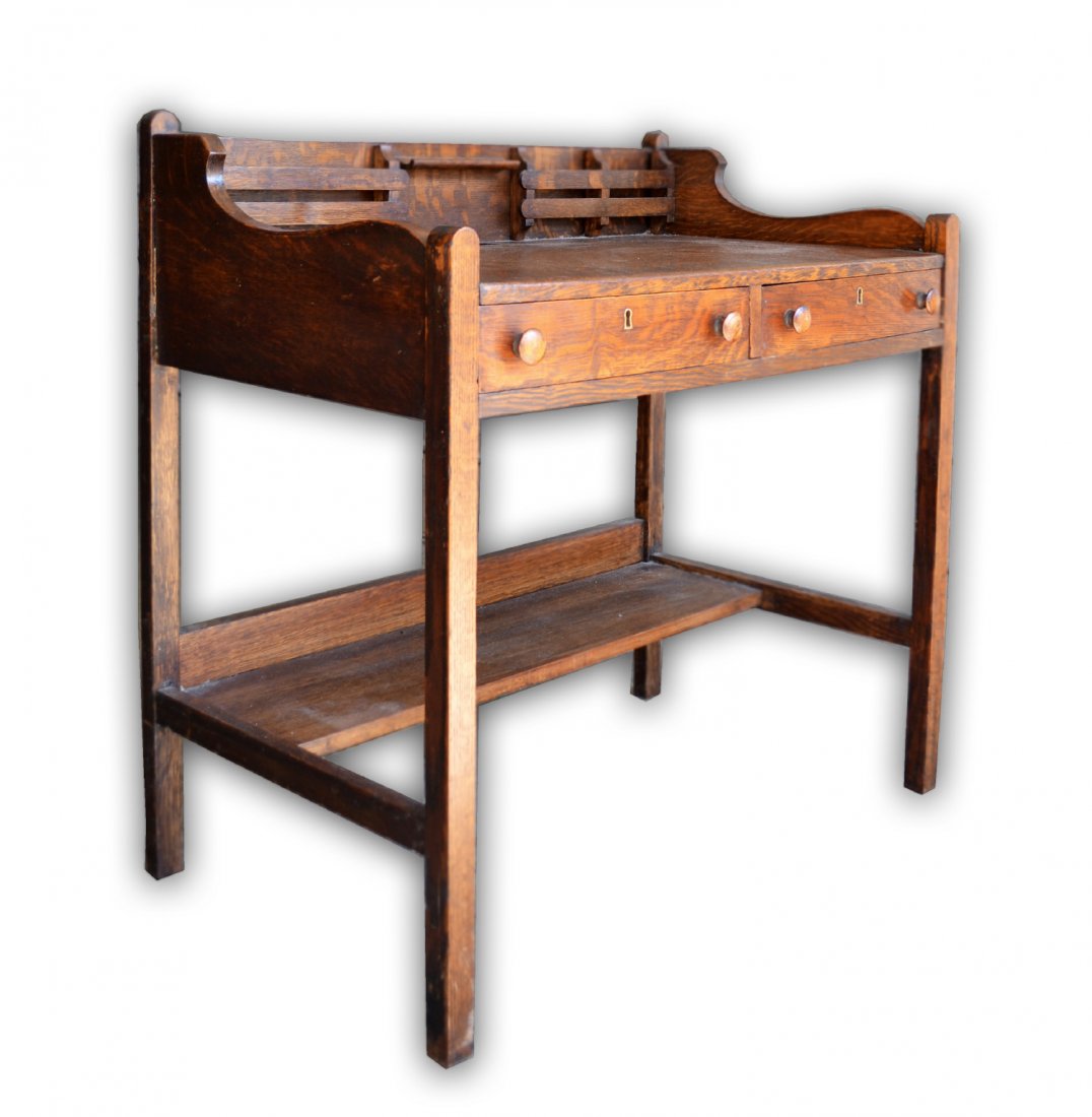 Desk, Mission Style, fumed oak c. 1900-1910: Desk, Mission Style, Arts & Crafts period, fumed oak c. 1900-1910. - Two drawers, letters holders, pen holder and ink well with brass framed keyholes. Size: 34" H x 34.5" W x 20.75" D
