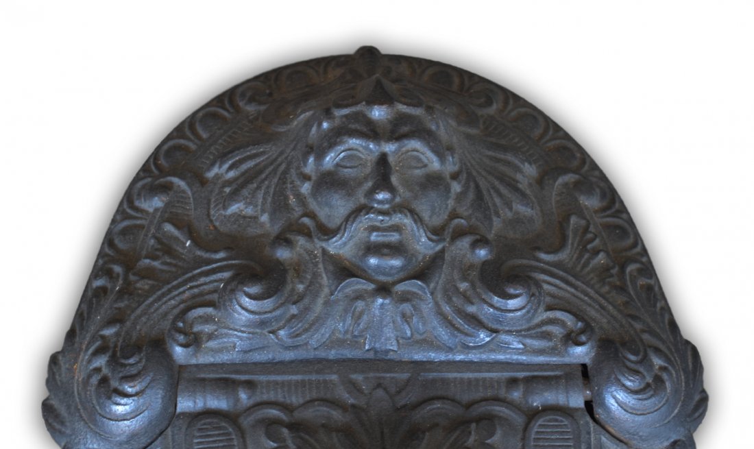 Coal Scuttle, cast iron, 19th C: Coal Scuttle, cast iron with Royal portrait and shell decoration, late 19th C. Size: 13" H x 23.5" W x 15.75" D Weight: 45 lbs