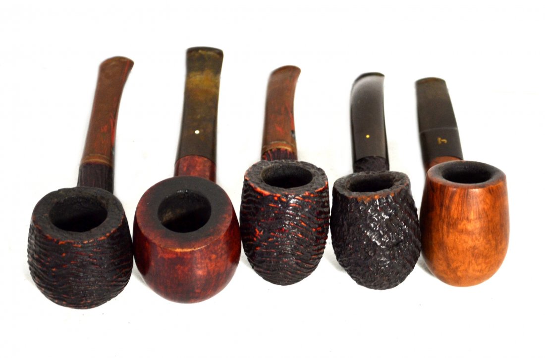 Pipes (5), marked, Dunhill's, Choquin, Jarl: Five tobacco pipes. (1) marked Jarl, Made In Denmark, 325, Special, J on stem. (2) marked Butz Choquin Rocamar, St. Claude France 1614, BC on stem. (3) marked Butz Choquin Rocamar, St. Claude France 1