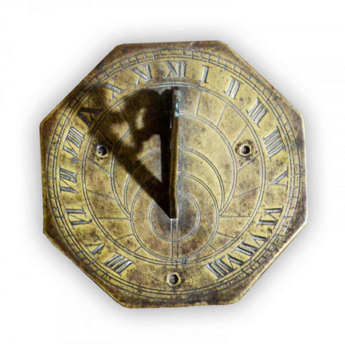 Sundial, English 18th C 5" Diameter: A brass sundial having an engraved, octagon shaped face, with elliptical design. Circa 1800. Size: 3.25" H x 5" Diameter Weight: 1/2lb