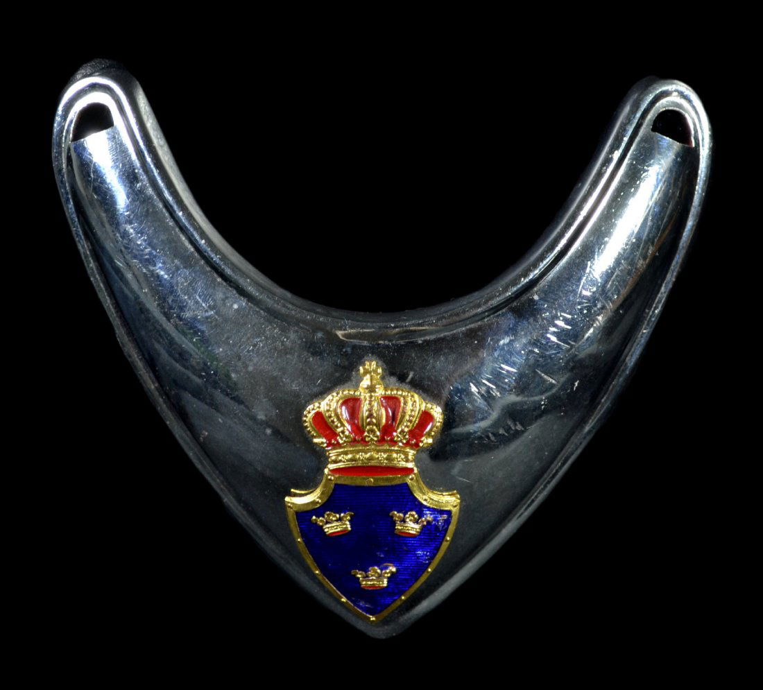 Gorget, Swedish Army, Model 1799: A Model 1799 Swedish Army Gorget worn by the commander of the Royal Palace Guards. A highly polished steel gorget with an red and blue bronze enameled seal. See history below. Size: 5.5" H. x 5.5" W.