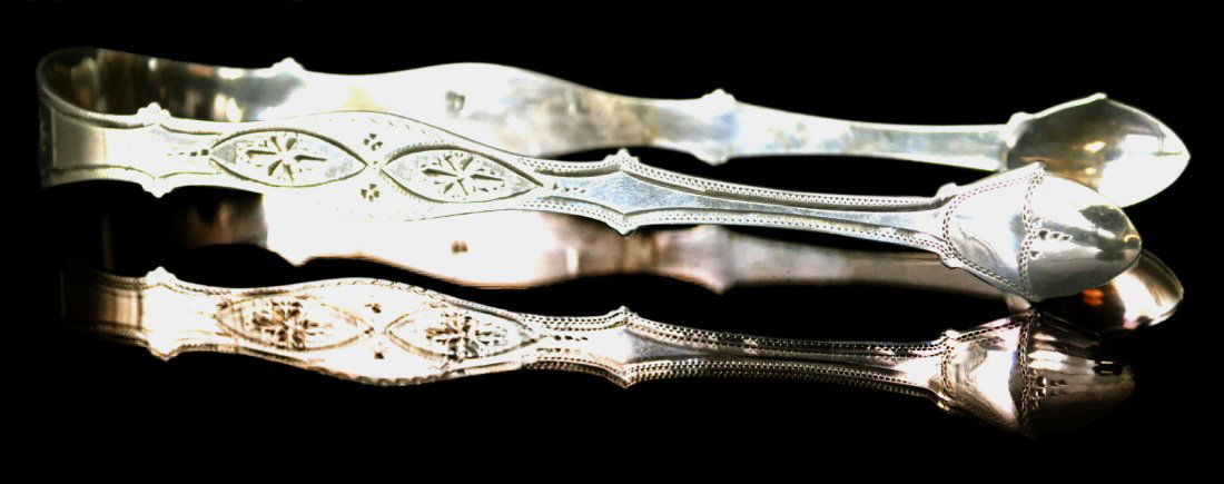 Sugar Tong, Silver, P & A. Bateman, 1806, 1.2 oz.: Sugar Tong, Silver, P & A. Bateman, 1806 Form: Sugar Tong Country of Origin: England , London Other Marks Duty mark , lion passant , letter date Decoration: Bright cut design with scripted monogram L.