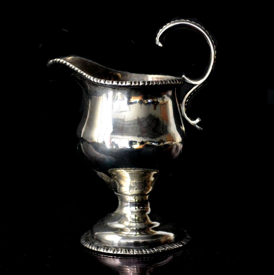 Creamer, Silver, George III, 18th Century, 4 oz.: Creamer, Silver, George III, 18th Century Form: Creamer Makers Mark: SM Country of Origin: England, London Other Marks Lion passant, letter date obscured Decoration: Creamer has rope design on top, bo