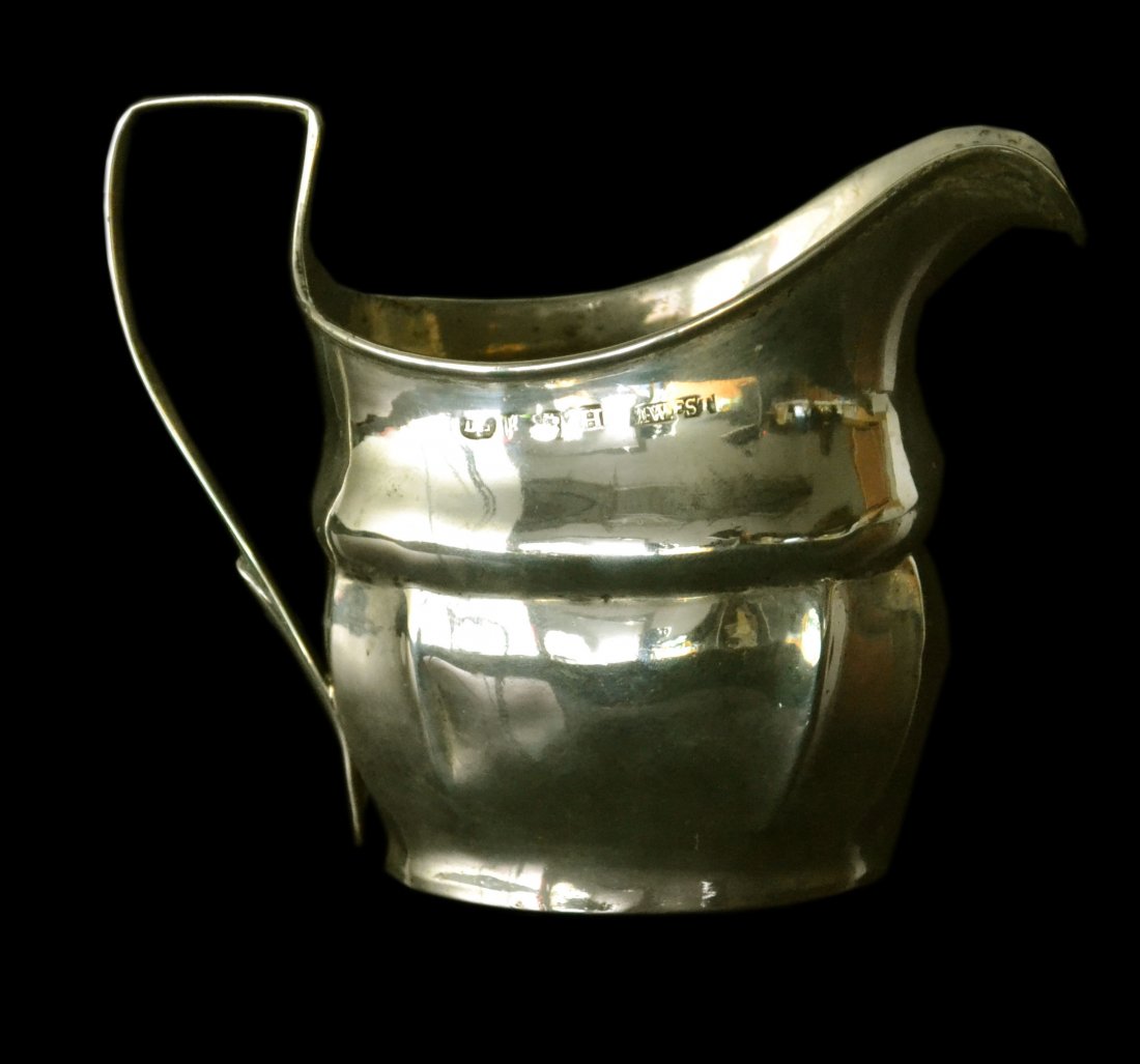 Creamer, Sterling, Daniel Egan, 1804, 4.8 oz.: Creamer, Sterling, Daniel Egan, 1804 Form: Creamer Makers Mark: D. E. Country of Origin: Ireland, Dublin Other Marks H, Twest obscured mark Decoration: Reeded with hammered body. Style: George III Con