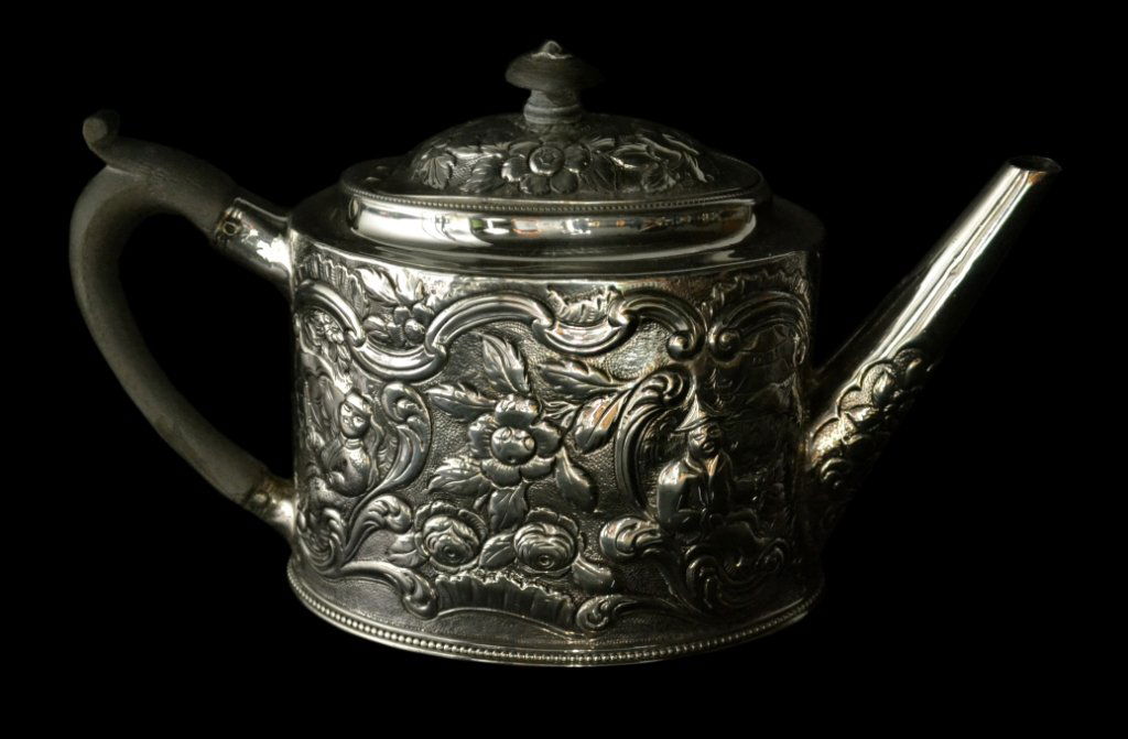Teapot, silver, Georgian, Hester Bateman, 1786: Teapot, silver, Georgian, Hester Bateman, 1786 Form: Teapot Makers Mark: HS Country of Origin: Great Britain Other Marks Lion passant, duty mark, town Decoration: Hester Bateman is world-renowned for