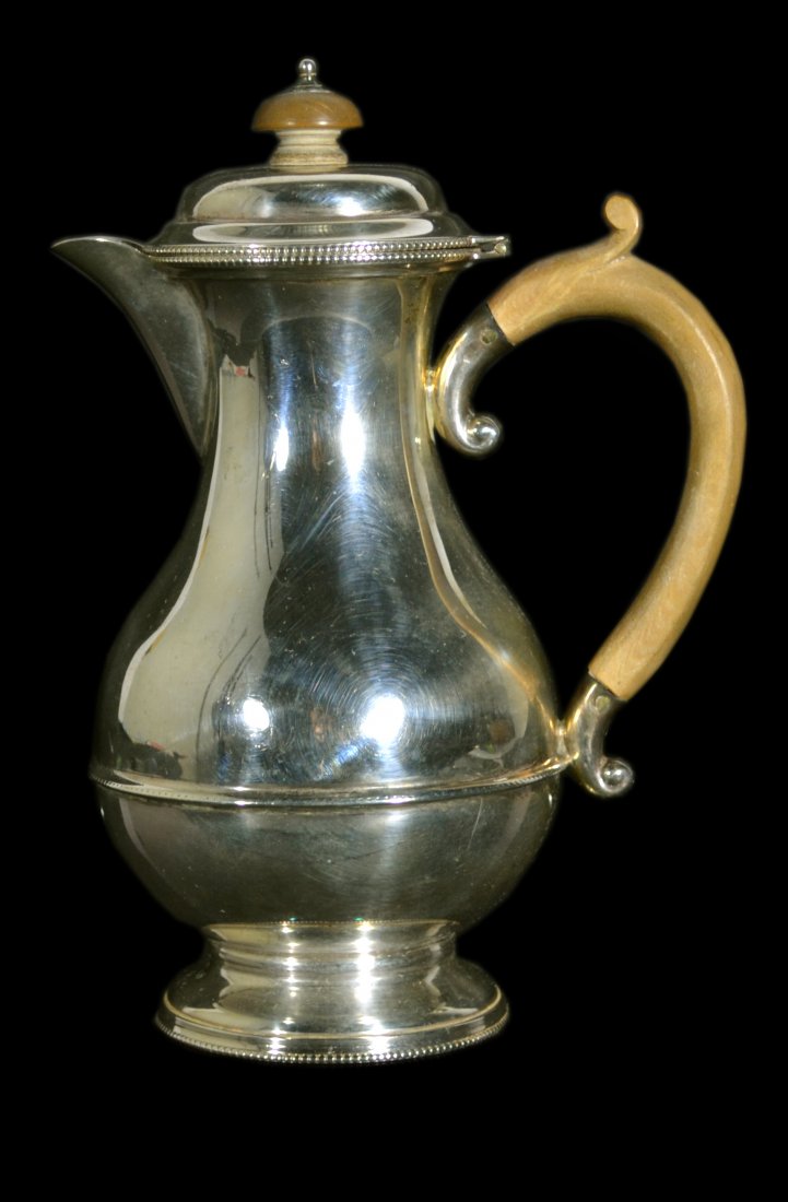 Coffee pot, sterling, English, Baluster, 1930: Coffee pot, sterling, English, Baluster, 1930 Form: Coffee pot Makers Mark: H. C. D. Country of Origin: Birmingham Other Marks Lion passant, anchor, date letter F Decoration: Baluster form with circul