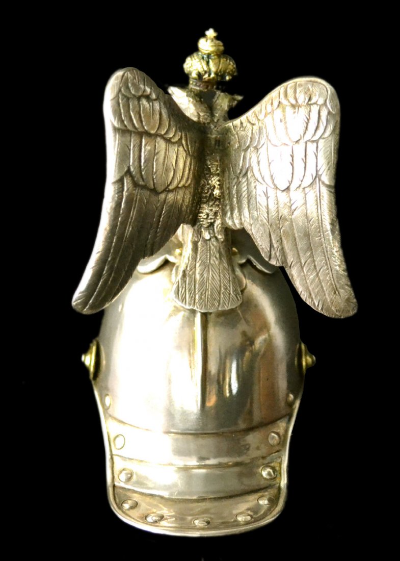 Helmet, silver, Imperial Russian, Faberge, 19th C: Helmet, silver, Imperial Russian, Faberge, 19th C Form: Helmet Makers Mark: Faberge mark Country of Origin: Russia Other Marks Stamped insided Decoration: Extremely Rare silver helmet by Faberge, beau