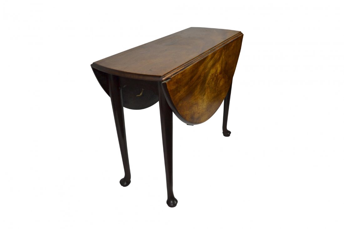 Table, dropleaf, Queen Anne, c1760: Table, dropleaf, Queen Anne, c1760 Table, Drop Leaf, Walnut Wood: Walnut Secondary Wood: Mahogany Joinery: Mortise & Tenon Legs & Rails Features: Oval shaped top; carved, select-wood legs, ending in p