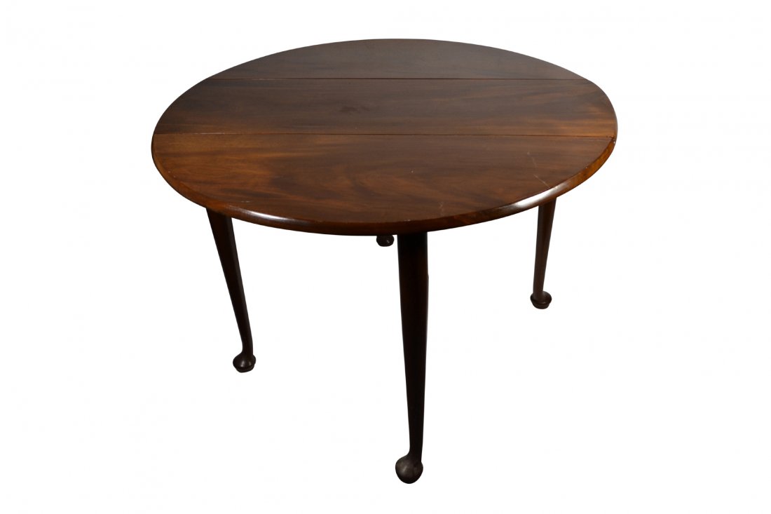 Table, dropleaf, pad feet, 18th C: Table, dropleaf, pad feet, 18th C Table, Dropleaf Wood: Mahogany Secondary Wood: Oak Joinery: Mortise & Tenon Features: Simple, oval molded top; pad feet; carved legs; match plane tabletop by pass; se