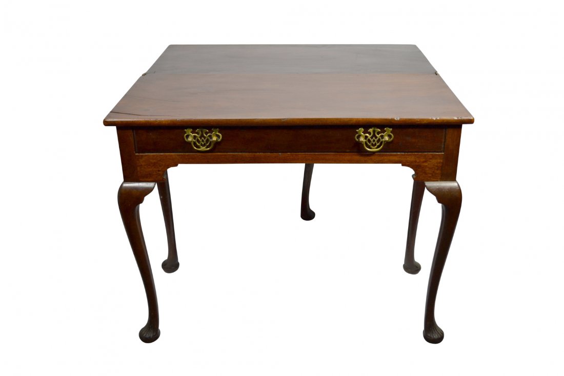 Table, swing leg, mahogany, c. 1840: Table, swing leg, mahogany, c. 1840 Game Table, Single Drawer Wood: Mahogany Secondary Wood: Oak Joinery: Dovetail Features: Single drawer, carved cabriole legs; folding top; brass hardware, probably 