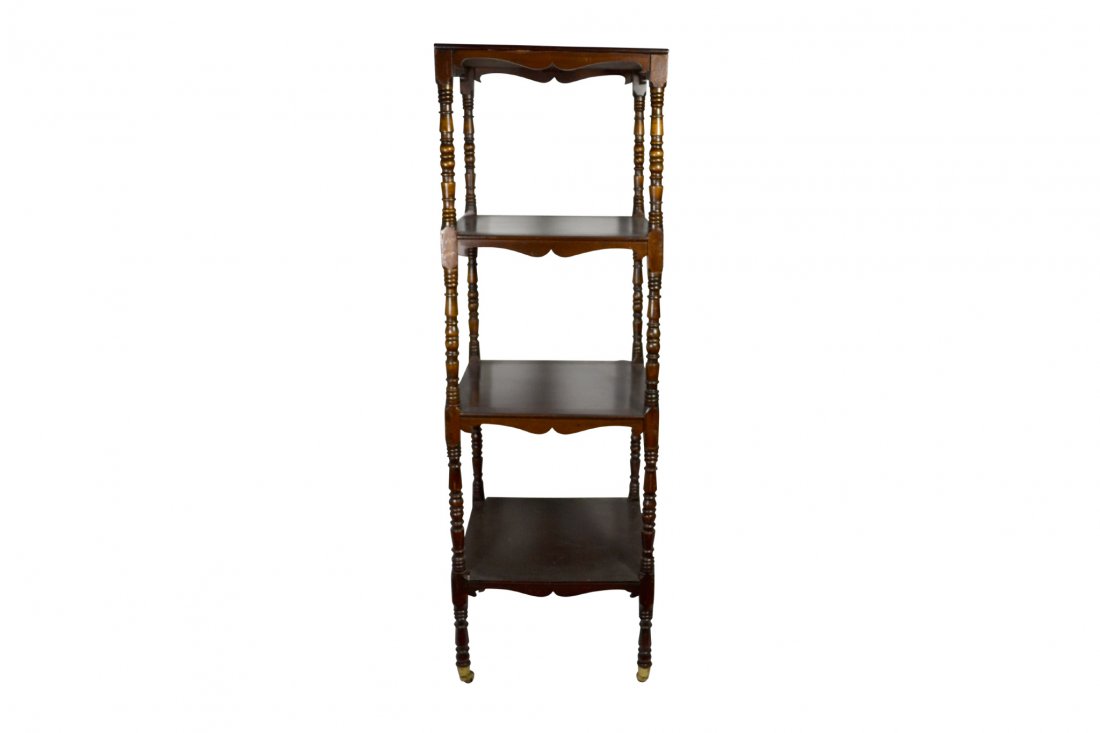 Etegere, mahogany, English 19th C: Etegere, mahogany, English 19th C Etegere Wood: Mahogany Joinery: Mortise & Tenon Features: Turned legs, cyma recta shaped aprons; solid mahogany shelving; turned legs resting on brass castors. Date: 