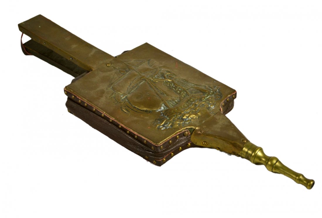 Bellows, Brass, Ship Design, Circa 1920: Bellows, Brass, Ship Design, Circa 1920 Bellows Material: Brass, wood, leather Construction: Stamped brass, leather riveted to wood Features: Depicts a ship sailing the ocean. Engraved scroll decorati