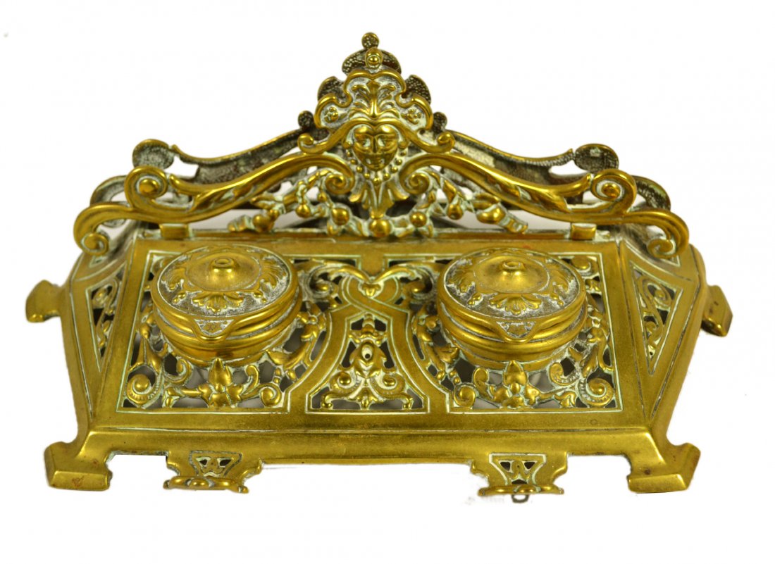 Inkstand, Victorian, Pen Tray & Letter Rack: Inkstand, Victorian, Pen Tray & Letter Rack Inkstand Material: Brass and stoneware Construction: Cast Features: Ornate design. Pen tray and letter rack. Original stoneware ink holders. Marked on botto