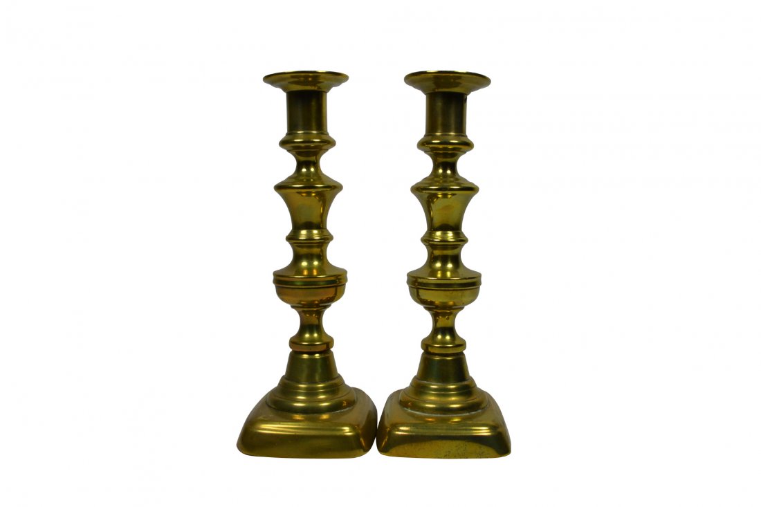 Candlesticks, Brass, English, c. 1840: Candlesticks, Brass, English, c. 1840 Pair of candlesticks Material: Brass Construction: Cast Features: Push up underneath base. One candlestick is missing the brass button on the push up. Period: Cir