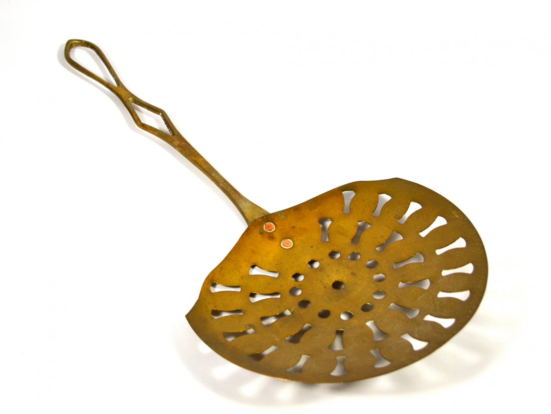 Skimmer, Brass, 19th Century: Skimmer, Brass, 19th Century Skimmer Material: Brass Construction: Copper riveted to handle Features: Dished Period: 19th century Size: 19" L x 8.5" W Weight: 1lb Condition: Very good. Provenance: The