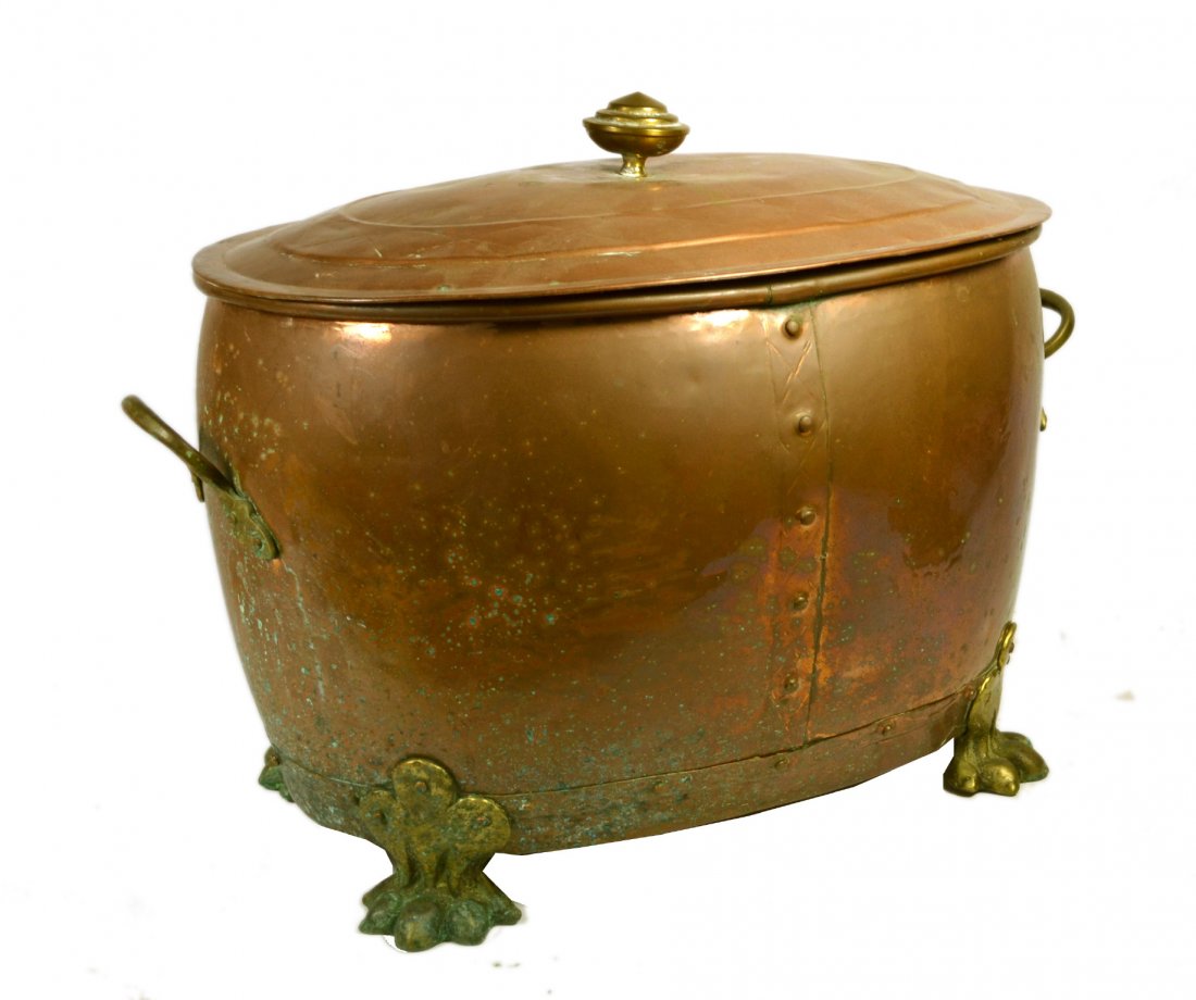 Covered Pot, Copper w/ Brass Feet, C. 1850: Covered Pot, Copper w/ Brass Feet, C. 1850 Covered pot. Material: Copper and brass. Construction: Cast and riveted. Features: Four brass feet in the form of claws support the pot. Two brass handles ar