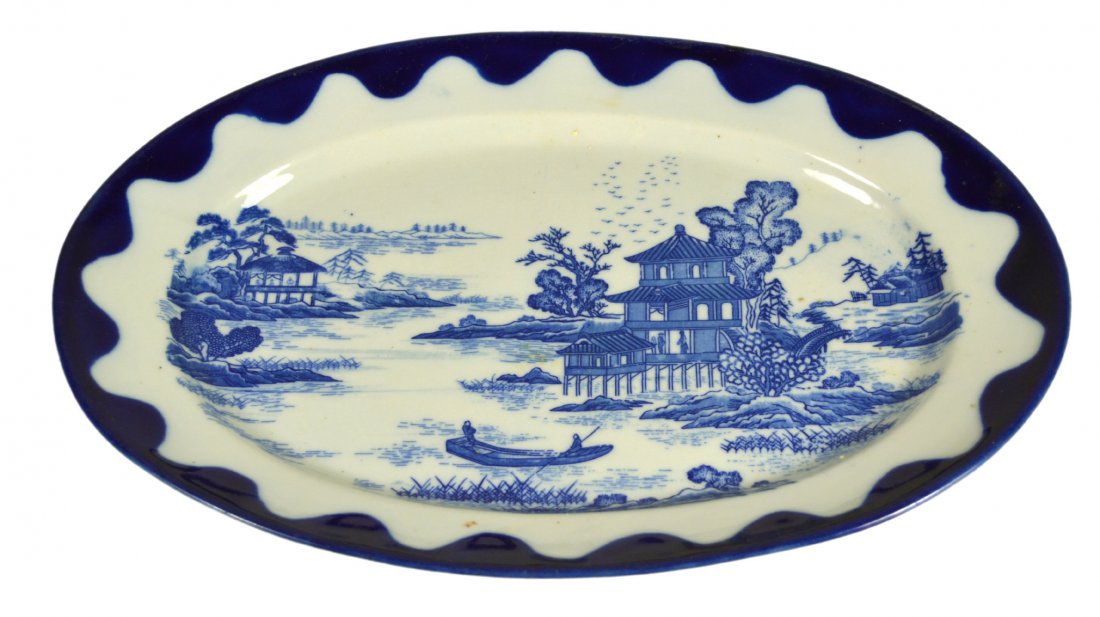 Platter, Chinese Export, Willow Pattern, 1850: Platter, Chinese Export, Willow Pattern, 1850 Form: Platter Components: Hard paste Decoration: Willow pattern depicting pagodas, trees, water, boats and people. Colors: Blue Markings: None Date: Circa