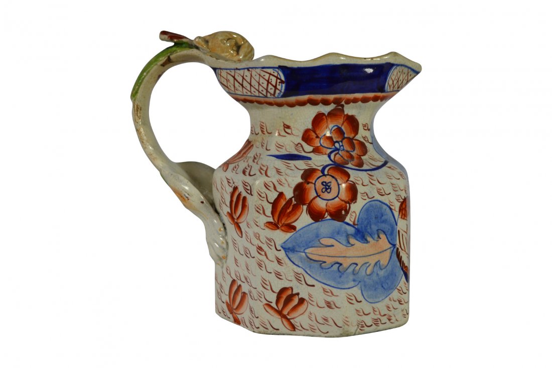 Pitcher, Mason Ironstone, English, Circa 1820: Pitcher, Mason Ironstone, English, Circa 1820 Form: Pitcher Components: Hard paste Decoration: Hand painted floral and foliate decorations. Handle is in the shape of a dragon and its two feet are atta