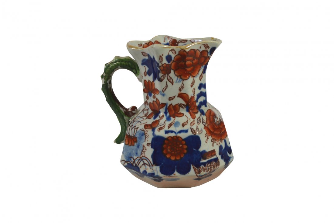 Pitcher, Mason Patent Ironstone, c. 1830: Pitcher, Mason Patent Ironstone, c. 1830 Form: Pitcher Components: Hard paste Decoration: Hand painted with floral and foliates. Handle in the shape of a creature. Colors: Red, blue, orange, green Mar