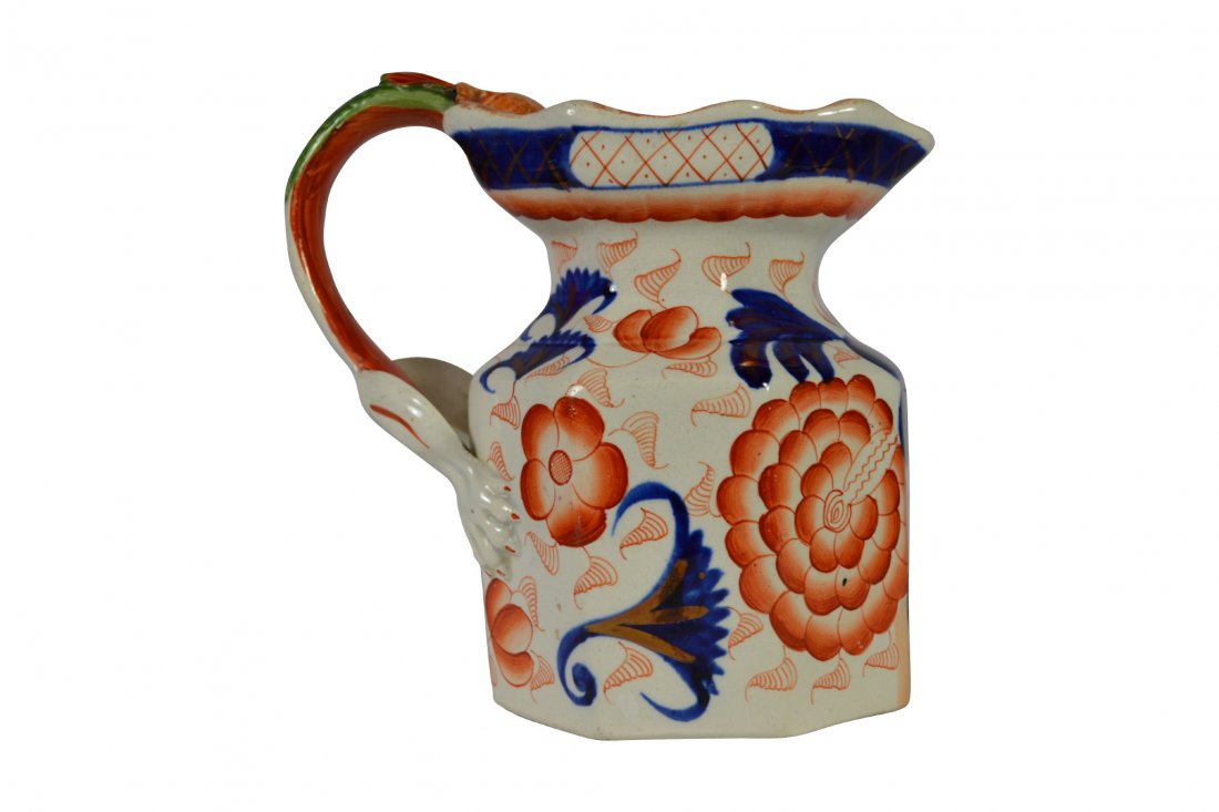 Pitcher, Davenport, Ironstone, Circa 1815: Pitcher, Davenport, Ironstone, Circa 1815 Form: Pitcher Components: Hard paste Decoration: Hand painted. Fanciful handle in the shape of a dragon. Its head faces into the pitcher while its two feet ar