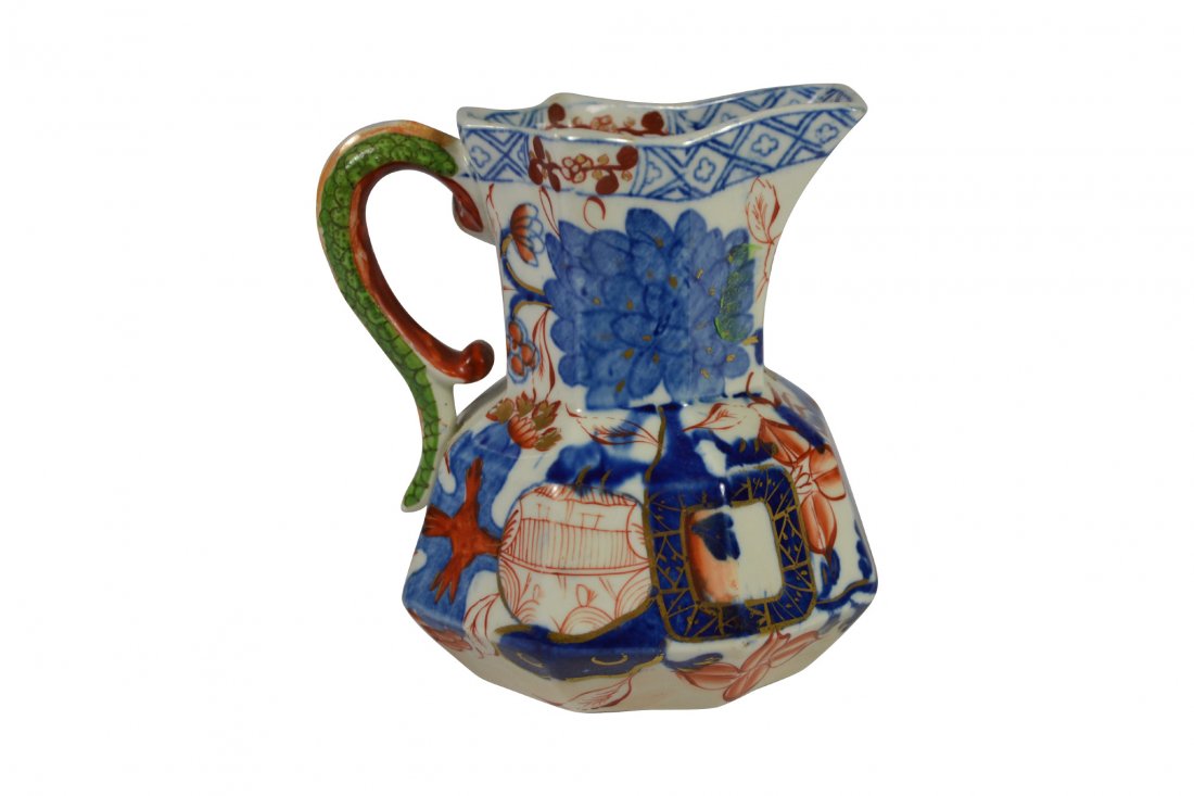 Pitcher, Miniature, Davenport Ironstone, c. 1840: Pitcher, Miniature, Davenport Ironstone, c. 1840 Form: Pitcher Components: Hard paste Decoration: Hand painted depicting flowers, foliates and pagodas. Gold highlights. Handle is in the form of a crea