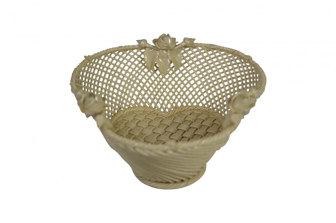 Basket, Belleek, Irish Porcelain: Basket, Belleek, Irish Porcelain Form: Basket Components: Hard paste Decoration: Rim decorated with flowers and shamrocks. Colors: White Markings: 'Belleek Co. Ireland' Date: 19th century Provenance: