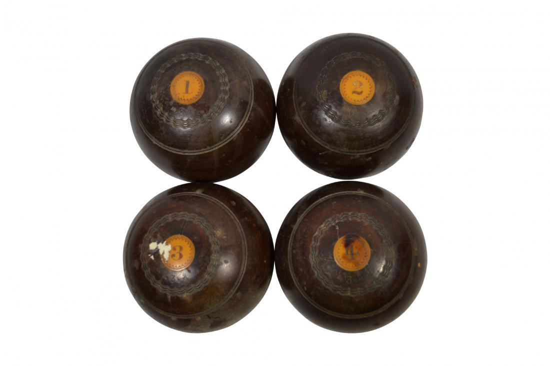 (4) Lawn Balls, gaming balls, Lignum Vitae,19th C: (4) Lawn Balls, gaming balls, Lignum Vitae,19th C Four lawn bowling balls Material: Lignum Vitae, Traditional wooden skittle balls made from the hardest wood known to man, Lignum Vitae. Should last lo