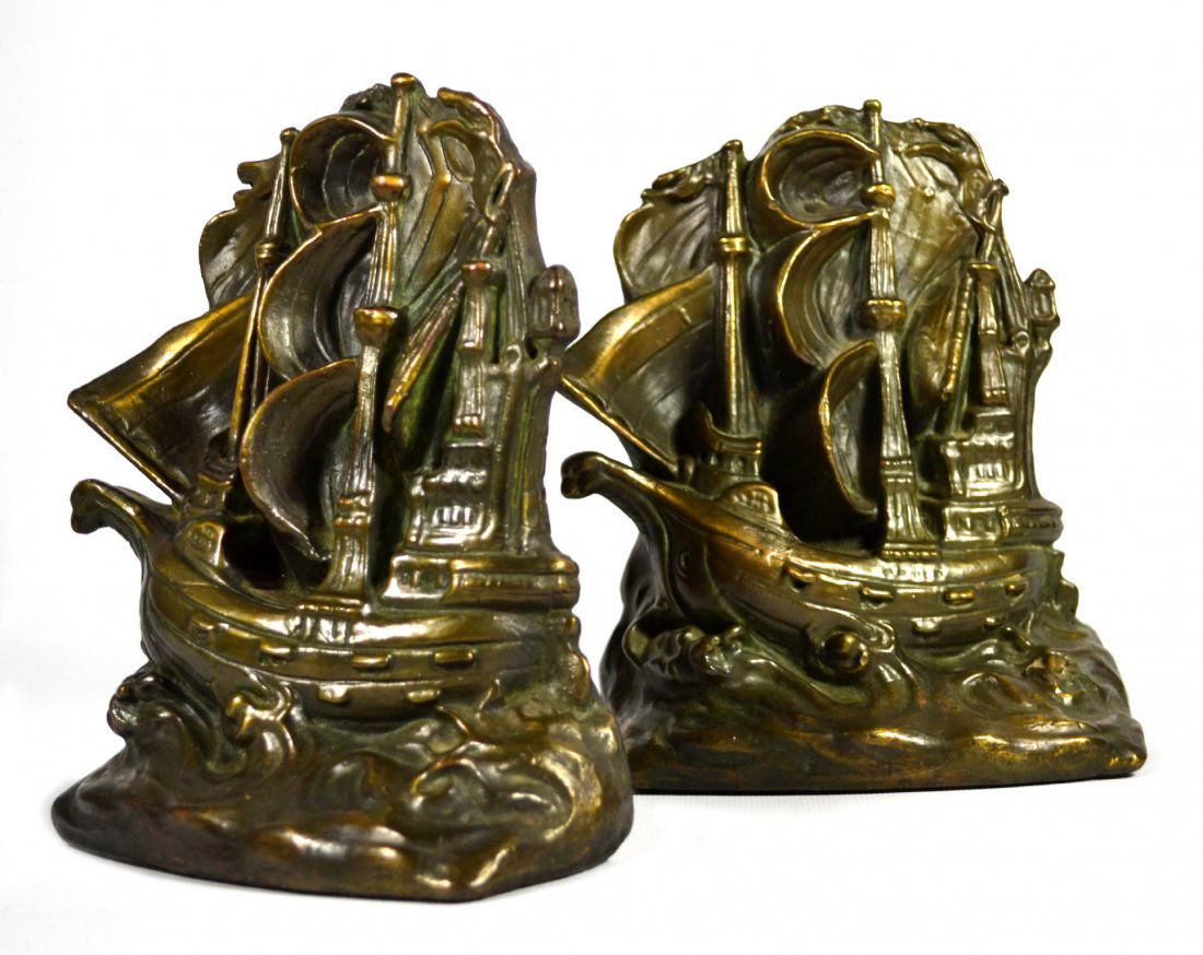 Bookends, "Invincible Armada", Armor Br., c. 1925: Bookends, "Invincible Armada", Armor Br., c. 1925 Bookends Circa 1925 Form: Vessel at full sail on the ocean Material & Finish: Armor bronze, patinated Construction: Cast over plaster compostition Mak