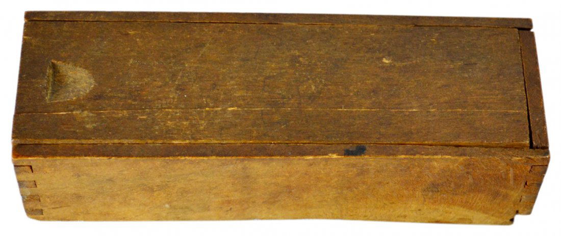 Dominoes, Ebony, Ivory,sliding box, 19th century: Dominoes, Ebony, Ivory,sliding box, 19th century Dominos Maker: English Materials: Bone and ebony Construction: Carved and pinned Labels/Tags: None Age: 19th century Description: Ebony and bone domino