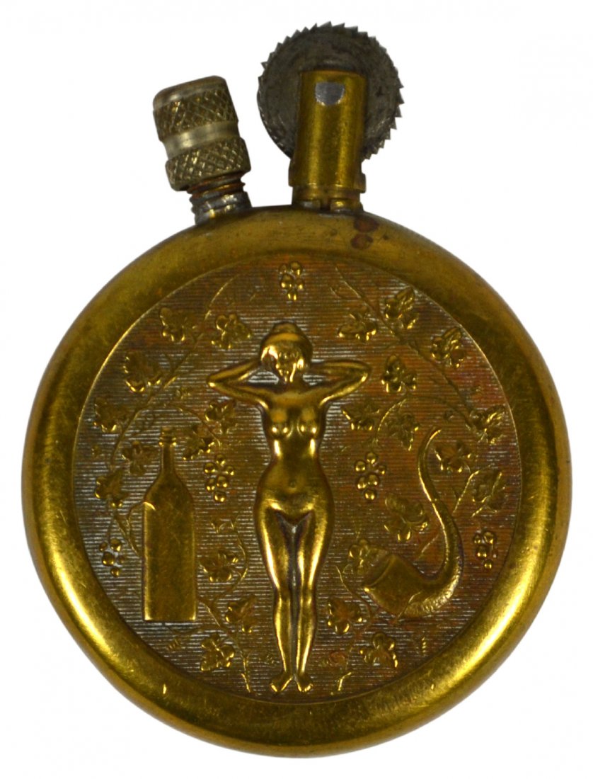 Lighter,WWI Trench Art Brass Copper Lighter, Nude: Lighter,WWI Trench Art Brass Copper Lighter, Nude Lighter Material: Brass Construction: Assembled, hammered , screwed, pinned. Marks: None Colors: Brass Features: The nude woman on both sides, one sid