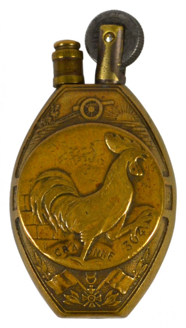 WW1 Lighter, British capture of Bullecourt 1917: WW1 Lighter, British capture of Bullecourt 1917 Trench lighter Material: Brass, copper, metal Construction: Assembled,punched, screwed, pinned Marks: Lens, Craonne, Bullecourt, Raux 304 Colors: Copper