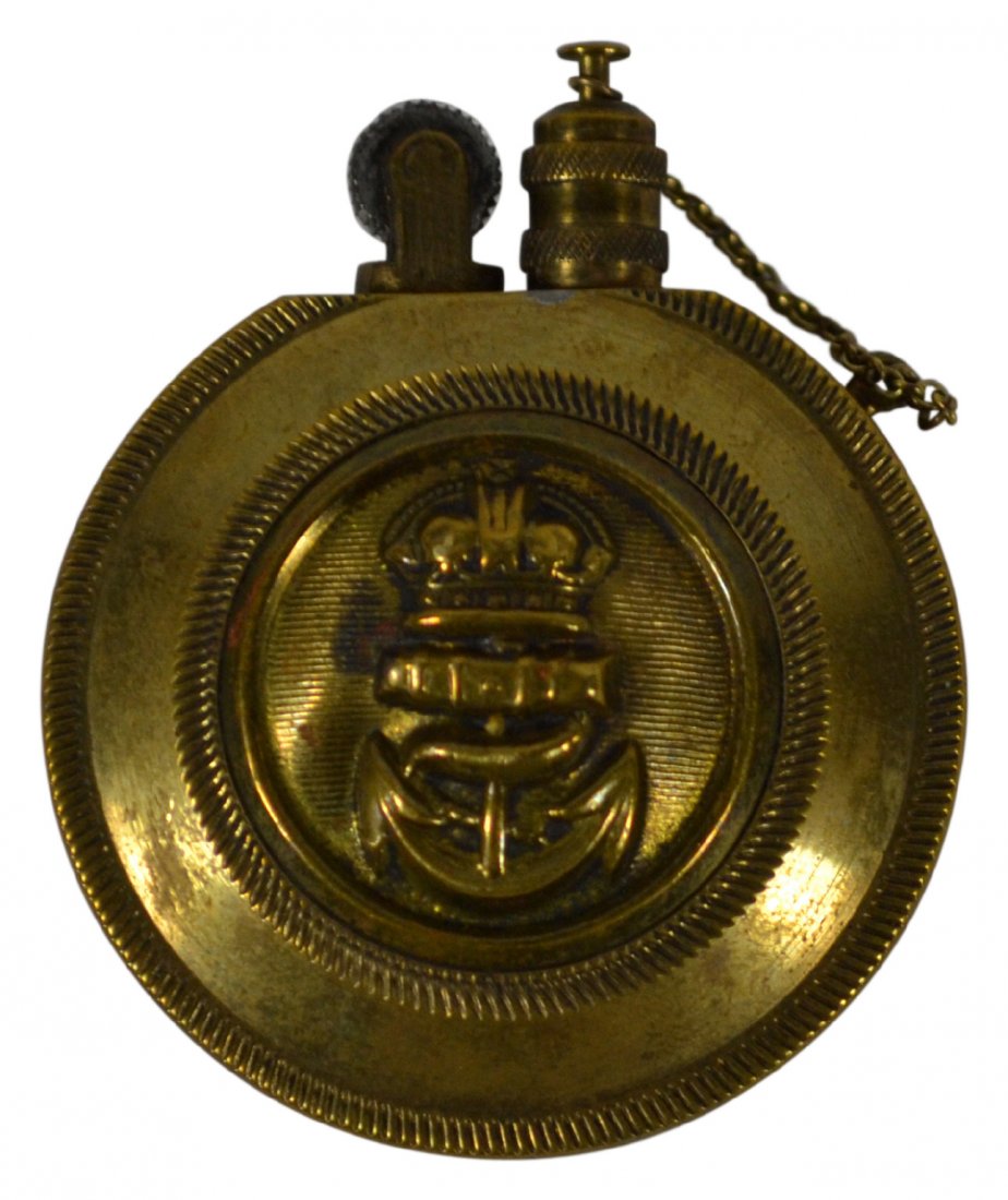 Lighter, trench, WW1, Navy, Anchor, Crown: Lighter, trench, WW1, Navy, Anchor, Crown Trench lighter Material: Brass Construction: Pinned, scrwed, punched, pinned Marks: Royal crown, anchor, cannon Features: Brass trench lighter with a cartouch