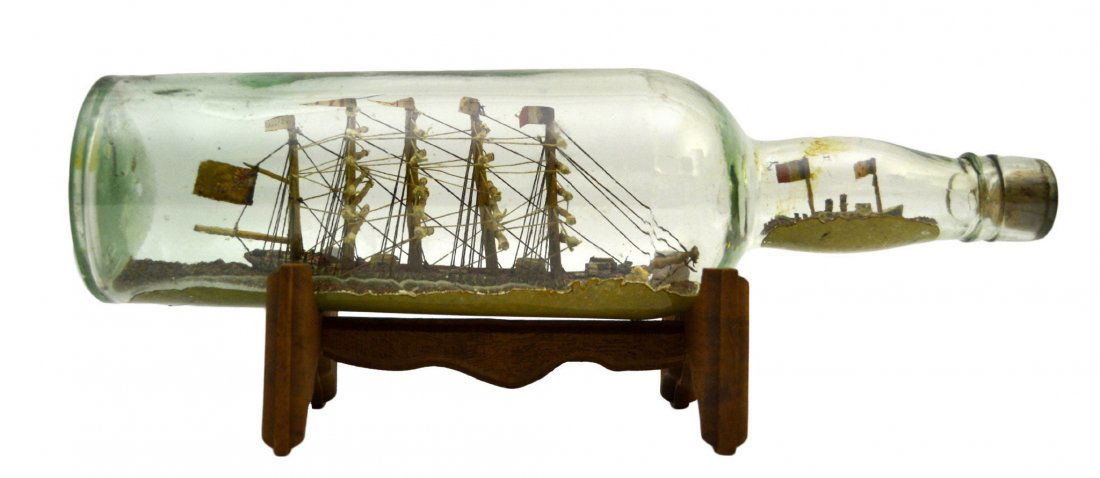 Ship in a Bottle, 'Maggie' & 'Ben', c.1900: Ship in a Bottle, 'Maggie' & 'Ben', c.1900 The Vessel Name: 'Maggie' & 'Ben' Country of Origin: Britain & France Type: Bark Hull: White & green Rigging: Better than avg, masts have stays Deck Furnitur